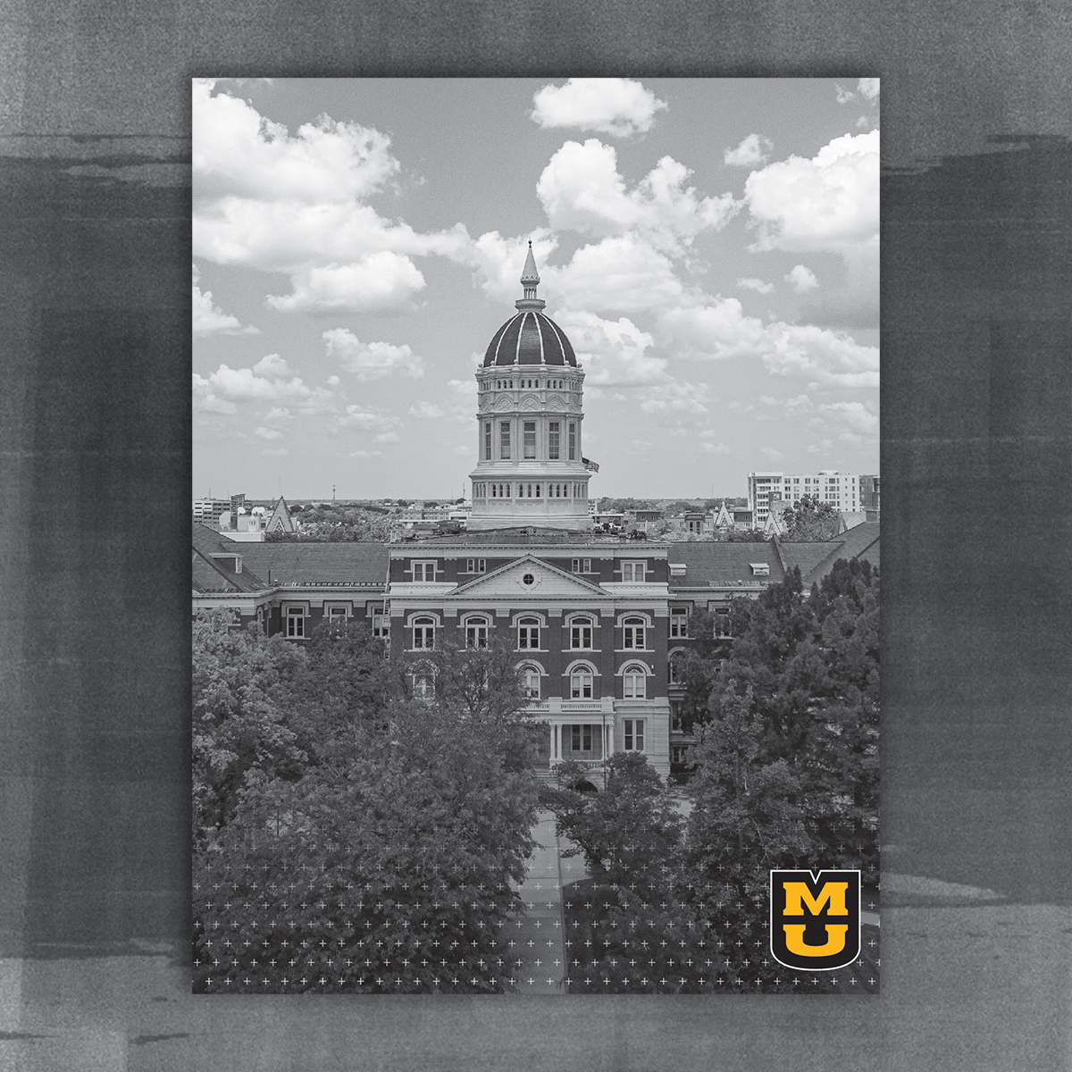 9x12 pocket folder design. Black and white image of Jesse hall and a stacked MU logo in the corner over a gradient plus pattern